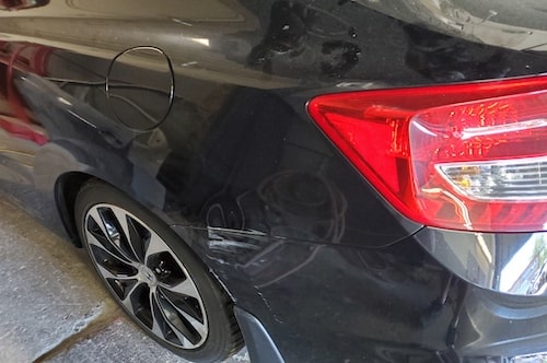 Honda civic bumper before repair at an auto body shop in scarborough
