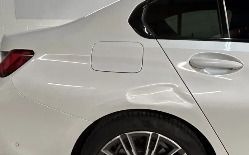 Vehicle dent being repaired