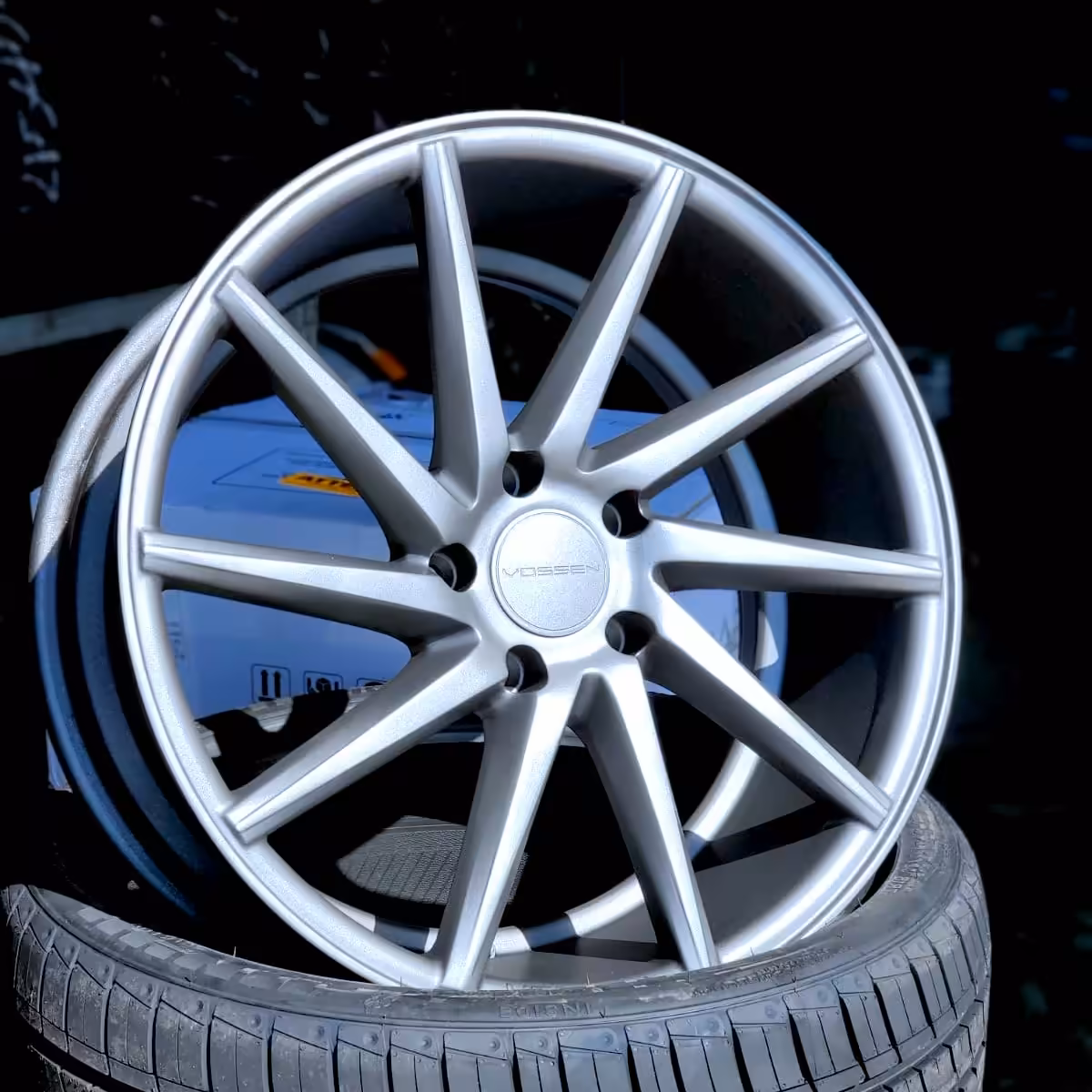 Vossen silver multi-spoke wheel inspection before powder coating